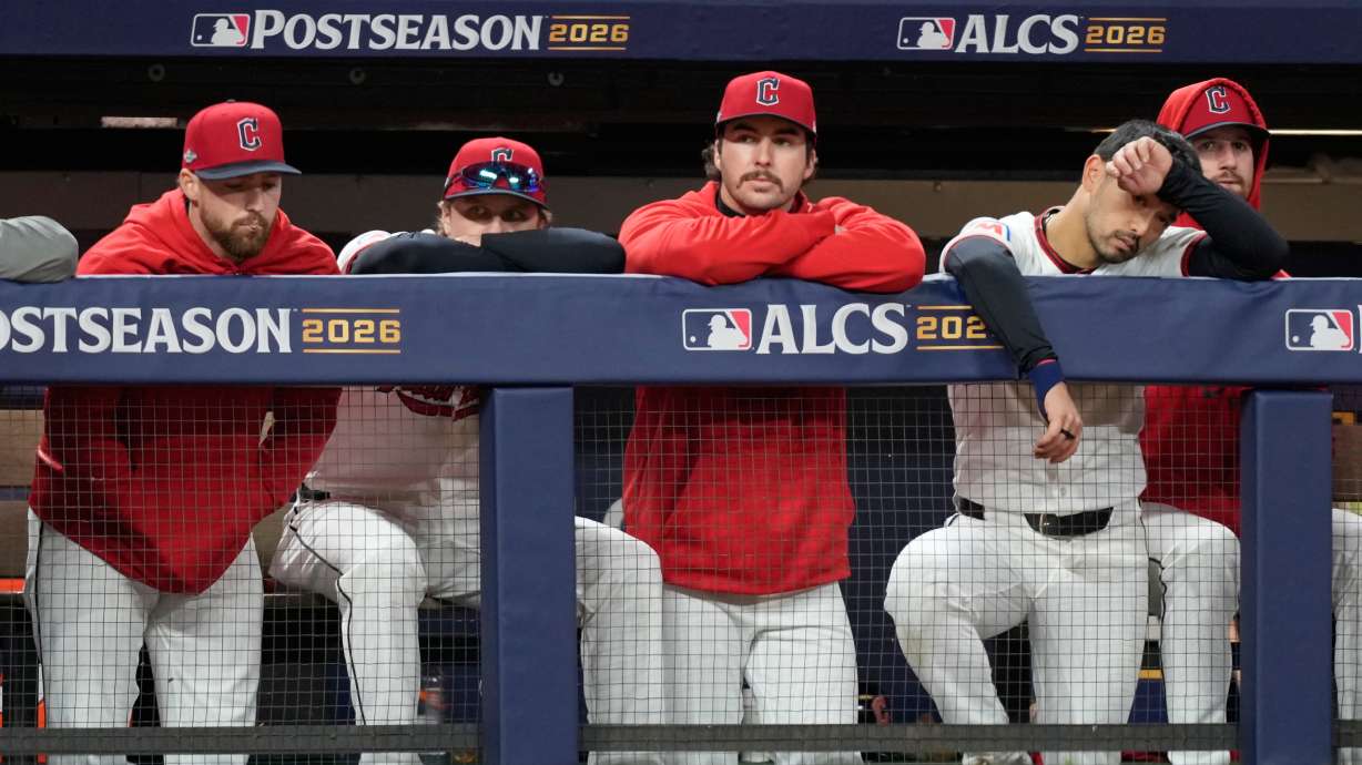 Members of the Cleveland Guardians watch during their lose against the Tampa Bay Rays in Game 5 of an American League Championship Series baseball game in Cleveland, Sunday, Oct. 18, 2026.