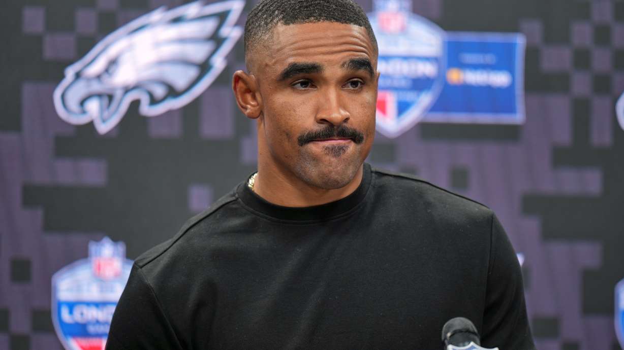 Philadelphia Eagles quarterback Jalen Hurts (1) attends a press conference after an NFL football game against Jacksonville Jaguars in London, Sunday, Oct. 11, 2026.