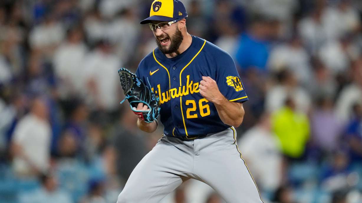 Milwaukee Brewers pitcher Aaron Ashby celebrates the final out of Game 4 of baseball's National League Championship Series between the Milwaukee Brewers and the Los Angeles Dodgers, Thursday, Oct. 15, 2026, in Los Angeles.