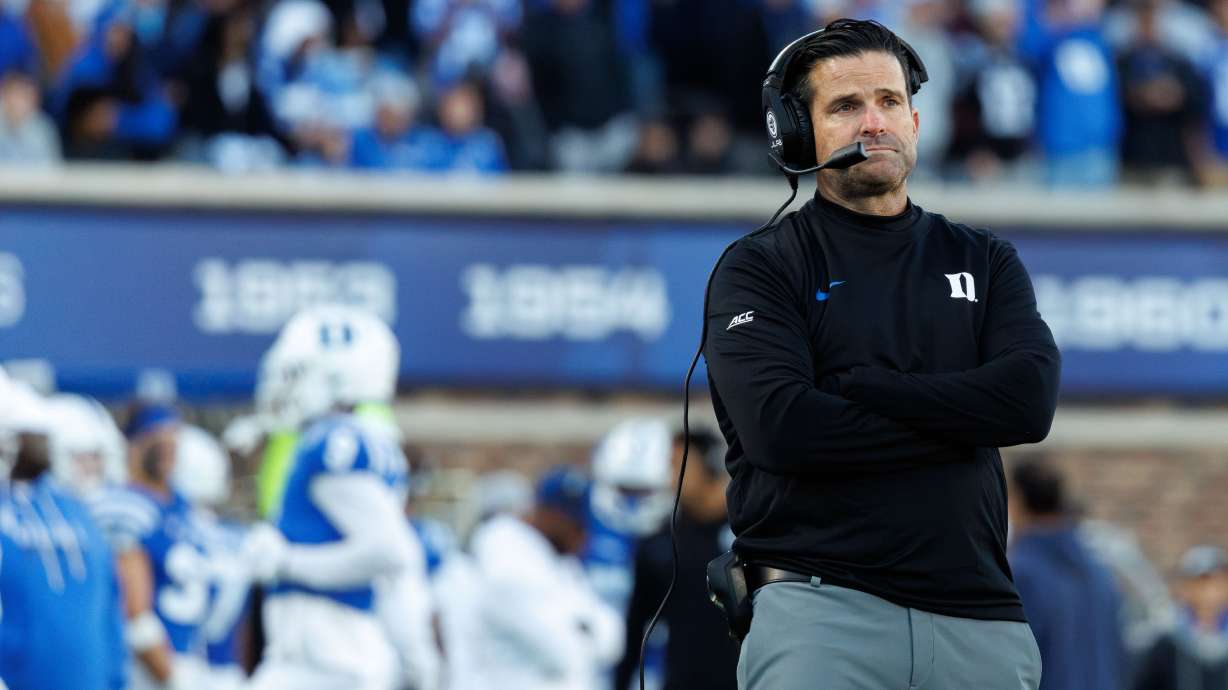 Duke head coach Manny Diaz looks toward he scoreboard during the second half of an NCAA college football game against North Carolina in Durham, N.C., Saturday, Oct. 17, 2026.