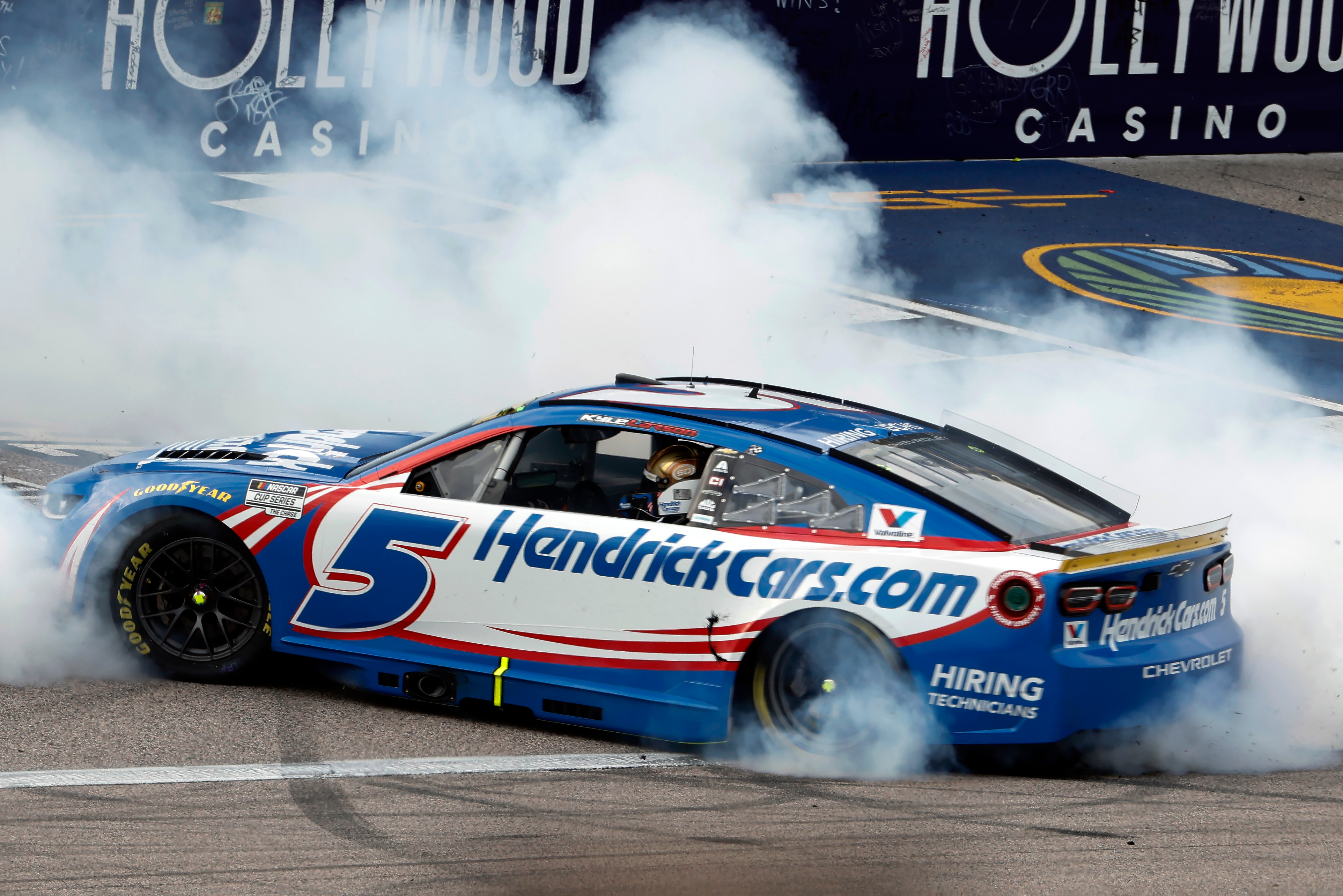 Kyle Larson does a burnout after winning a NASCAR Cup Series auto race in Kansas City, Kan., Sunday, Sept. 27, 2026. 