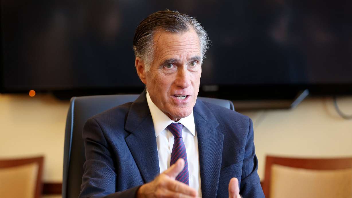 Sen. Mitt Romney, R-Utah, meets with Senate Democrats during their caucus meeting at the Capitol in Salt Lake City on Feb. 15, 2024.