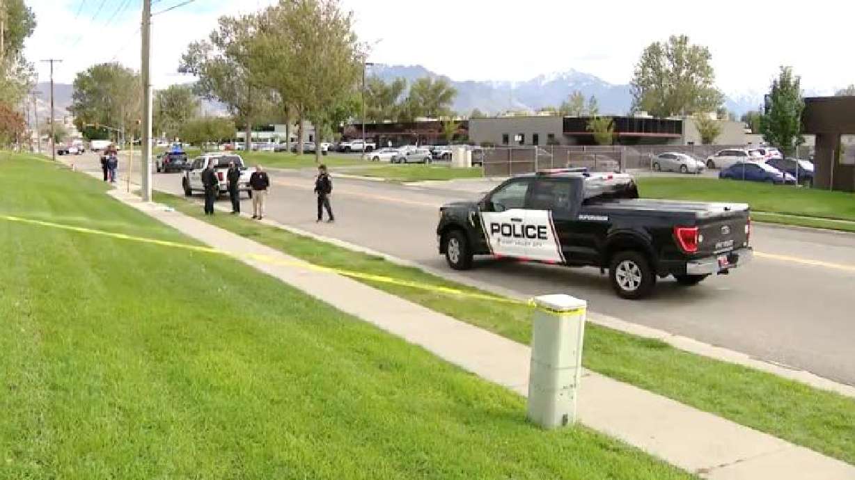 Police at the scene of a shooting in West Valley City on Monday.