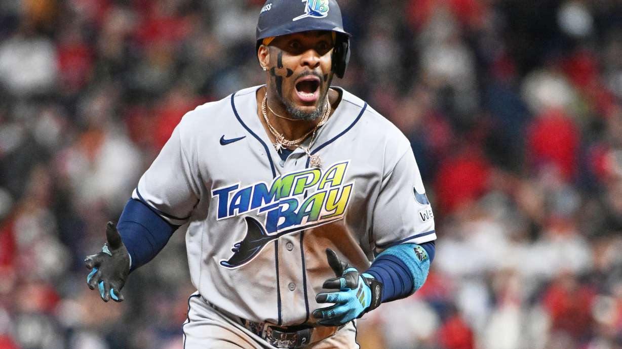 Tampa Bay Rays' Yandy Díaz celebrates a two-run home run against the Cleveland Guardians during the ninth inning in Game 4 of an American League Championship Series baseball game in Cleveland, Saturday, Oct. 17, 2026.