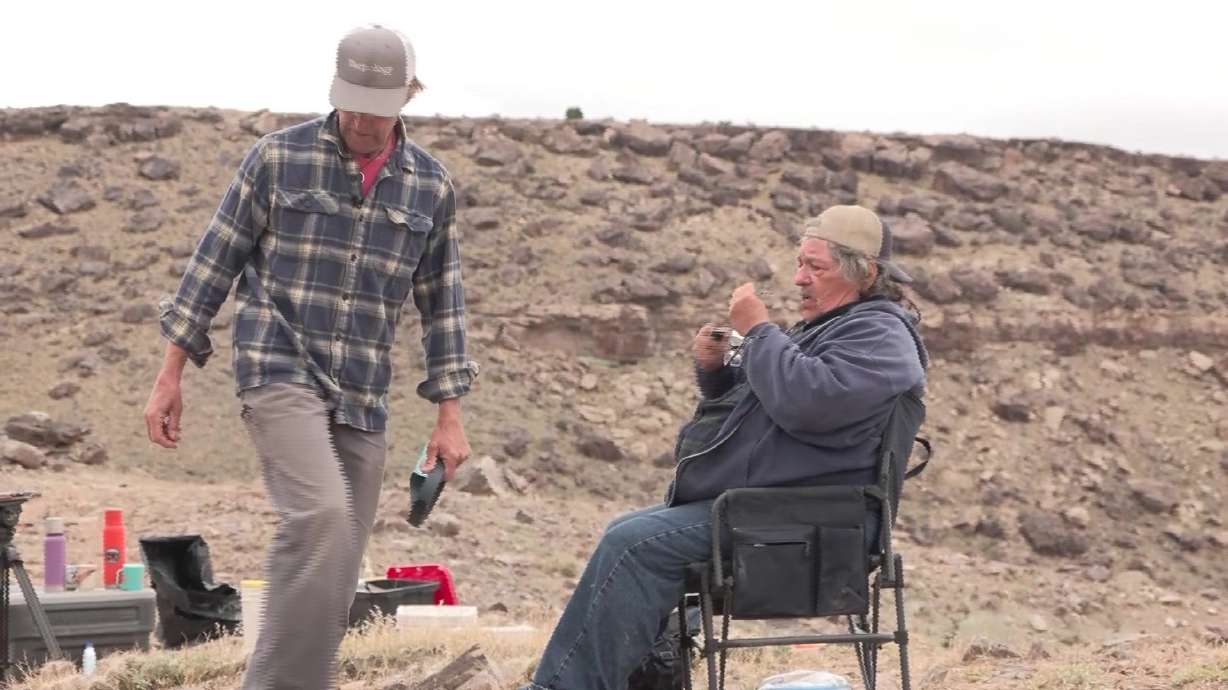 Don DeBlieux, Utah's assistant state paleontologist, left, and Utah State Paleontologist Jim Kirkland, right, work one of their final archeological digs together near Arches National Park.