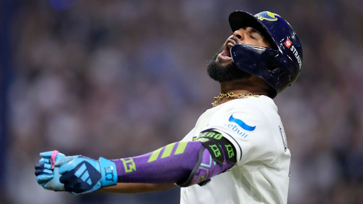 Tampa Bay Rays' Junior Caminero celebrates a two-run home run against the Cleveland Guardians during the seventh inning in Game 6 of an American League Championship Series baseball game in St. Petersburg, Fla. Monday, Oct. 19, 2026.