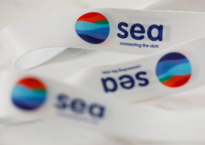 A lanyard showing logos of Southeast Asian e-commerce and gaming group Sea Ltd is pictured at their office in Singapore, March 5, 2021.