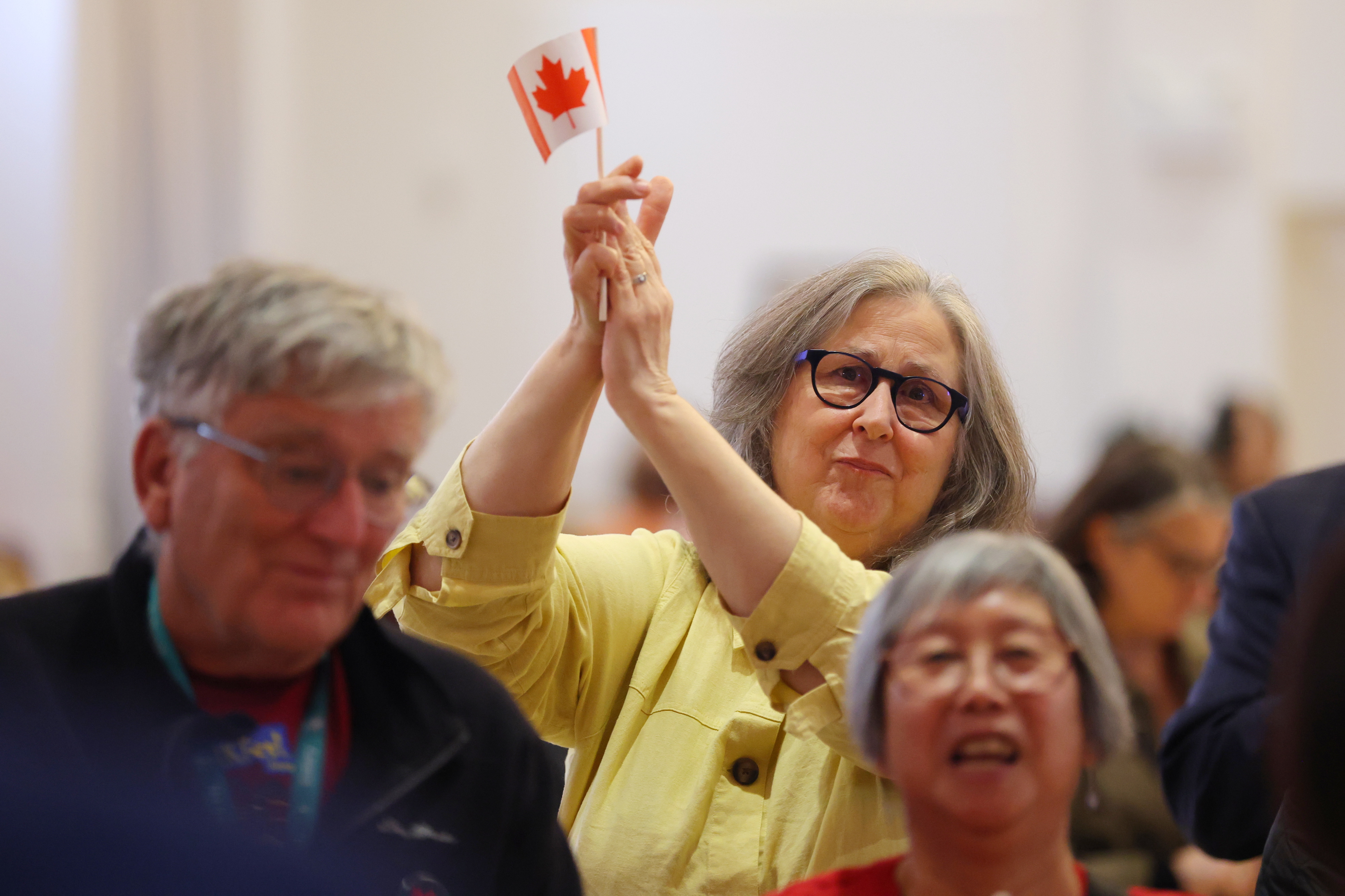 Supporters react to voting results at the pro-Canada watch party in Edmonton, Alberta, Monday. Albertans overwhelmingly voted down a referendum to become independent on Tuesday.