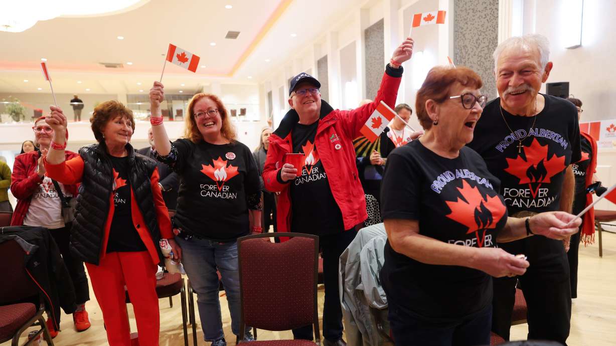 Supporters wait for results at the pro-Canada watch party in Edmonton, Alberta, Monday. Voters in the oil-rich province rejected a proposal to begin a process toward independence.