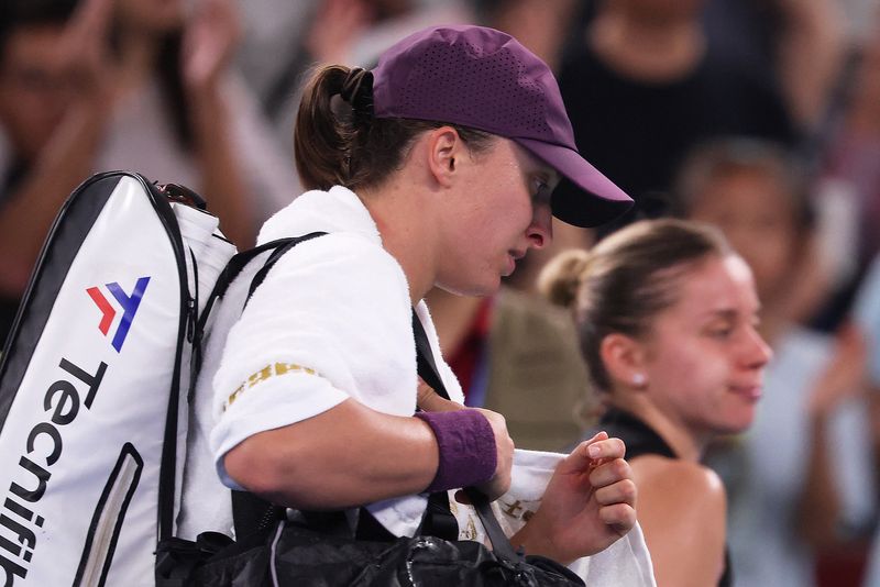 Tennis - WTA 1000 - Wuhan Open - Optics Valley International Tennis Center, Wuhan, China - October 17, 2026 Poland's Iga Swiatek leaves the court after losing her semi final match against Poland's Maja Chwalinska