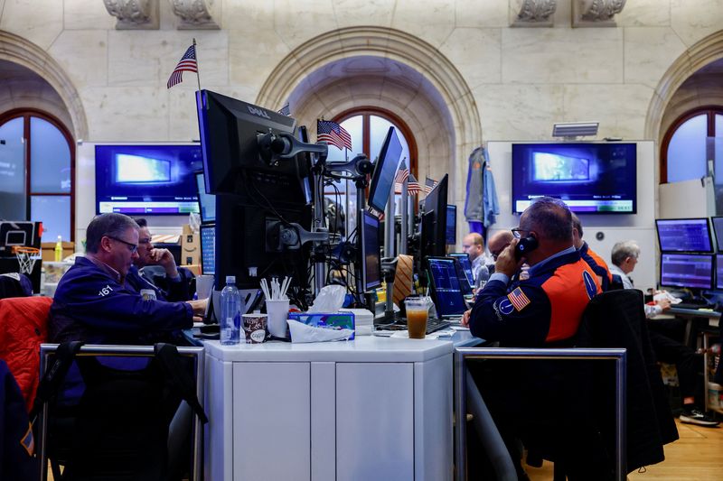 Nasdaq futures dip as oil prices climb, earnings loom