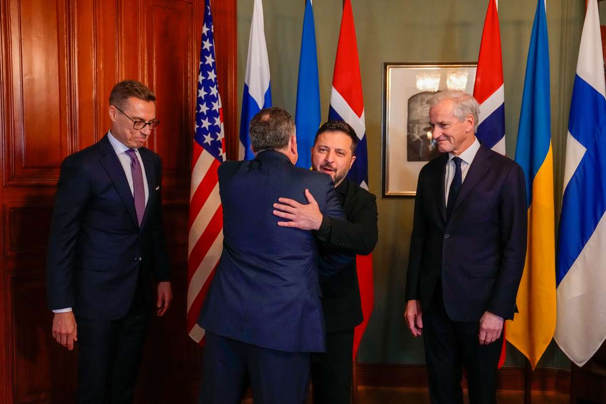 Ukrainian President Volodymyr Zelenskyy hugs envoy Steve Witkoff as Norwegian Prime Minister Jonas Gahr Støre and Finnish President Alexander Stubb look on, in Oslo, Norway, Tuesday. Witkoff was in Russia on Wednesday for talks with President Vladimir Putin.