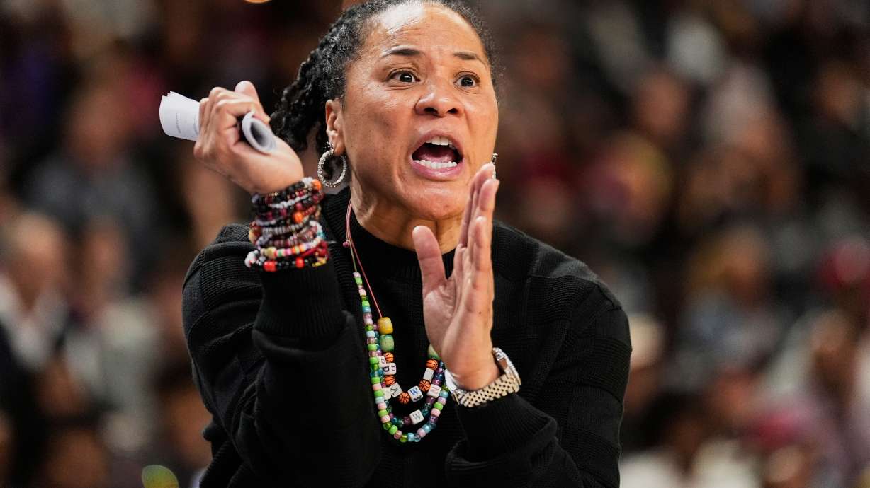 FILE - South Carolina head coach Dawn Staley reacts during the second half of an NCAA college basketball game against Texas in the final of the Southeastern Conference tournament, March 8, 2026, in Greenville, S.C.