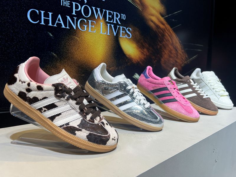 Germany's Adidas raises full-year profit outlook after record quarter