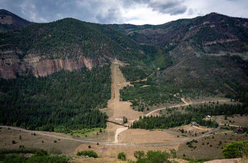 A cutout in the mountainside shows the path of the North Fork Siphon, a piece of the Central Utah Project that brings water down and up the mountains around the North Fork of the Duchesne River, on Wednesday, Aug. 12.