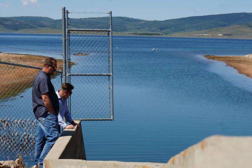Troy Ovard and Josh Darling of the Central Utah Water Conservancy District at Strawberry Reservoir on July 1.