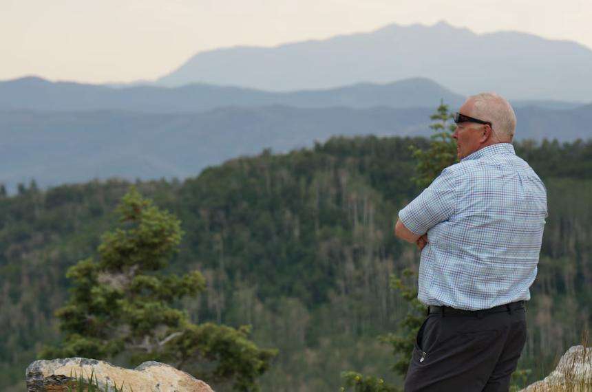 Jared Hansen, manager of the Central Utah Project, looks out at the divide between the Great Basin and the Colorado River Basin in the Wasatch Mountains on July 1.