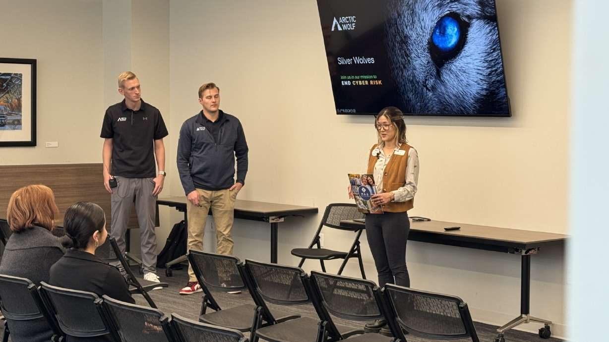 Representatives from Arctic Wolf and the Mountainland Association of Governments during an Oct.12 presentation at the Orem Public Library. With seniors considered one of the most vulnerable groups when it comes to cybercrime, a cybersecurity firm is doing what it can to help the elderly become more of a hardened target.