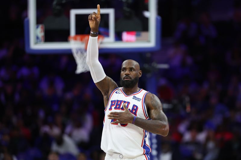 Oct 16, 2026; Philadelphia, Pennsylvania, USA; Philadelphia 76ers forward LeBron James (23) reacts in a game against the Boston Celtics at Xfinity Mobile Arena.