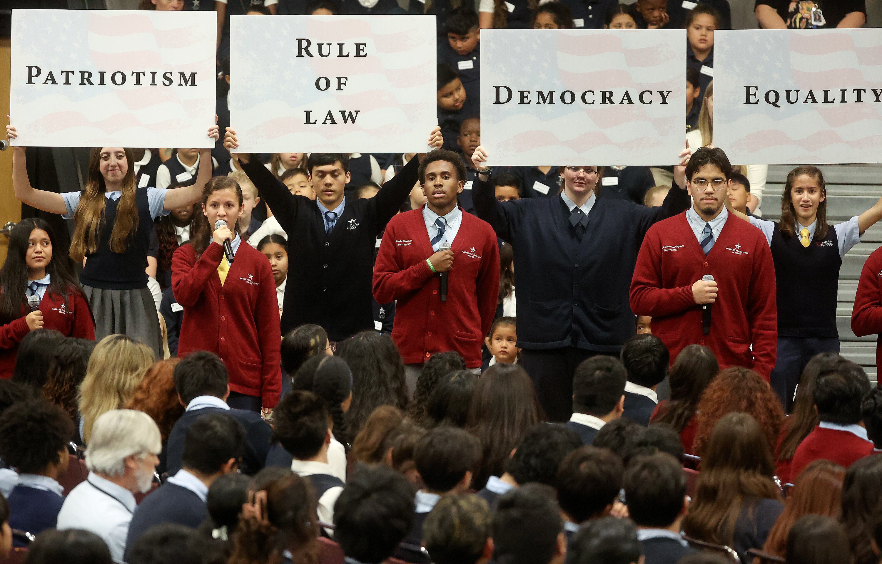 Students recite “My American Duty” as Secretary of Education Linda McMahon visits American Preparatory Academy in West Valley City on Tuesday. McMahon believed the school could teach the nation the meaning of patriotism again.