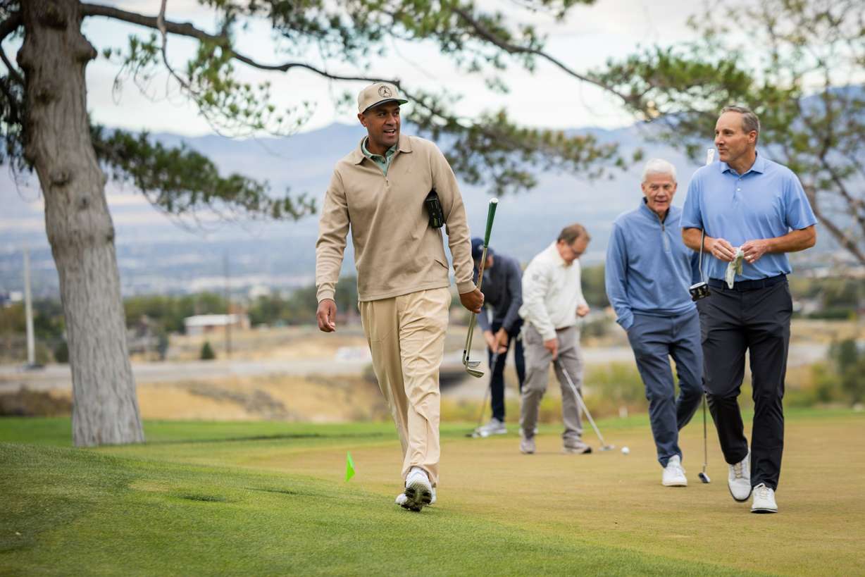 Tony Finau, left, golfs with community leaders in the "Readers Cup,” a golf event sponsored by Tony Finau and community leaders advocating for early literacy at The Country Club in Salt Lake City on Tuesday.