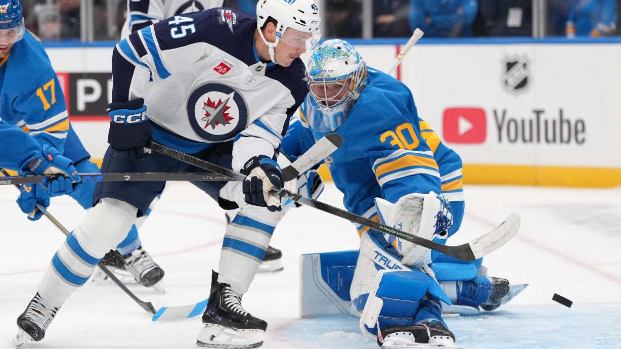 Winnipeg Jets' Cole Koepke (45) is unable to score past St. Louis Blues goaltender Joel Hofer (30) during the first period of an NHL hockey game Tuesday, Oct. 20, 2026, in St. Louis.