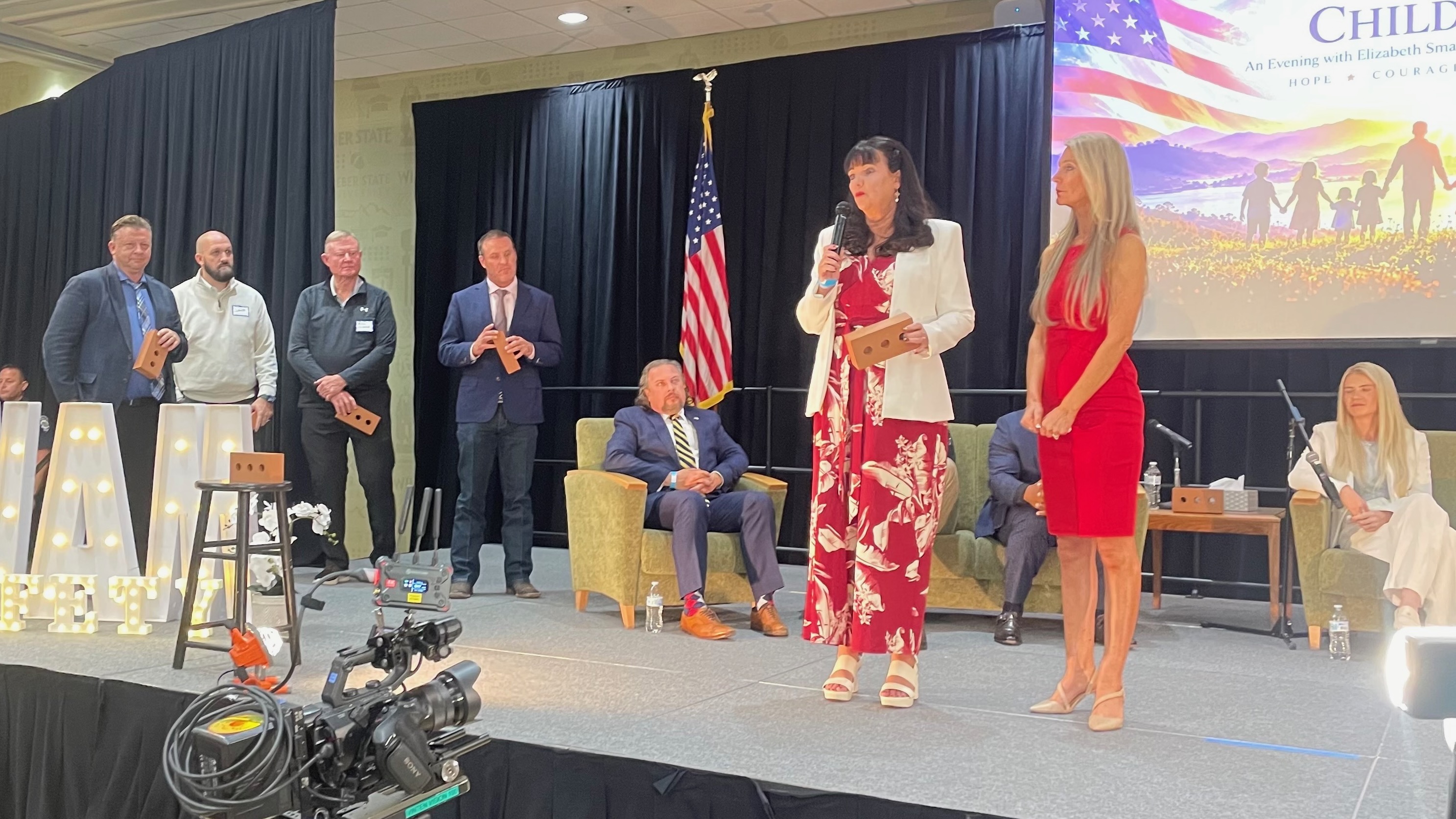 Elizabeth Smart is aiding in the push for creation of a three-digit emergency phone number for those suffering sexual abuse and being trafficked. She and Utah Sen. Heidi Balderree, R-Saratoga Springs, pictured speaking, addressed the issue at a panel discussion on Tuesday at Weber State University in Ogden.