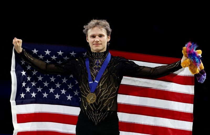 FILE PHOTO: Figure Skating - ISU Figure Skating World Championships - O2 arena, Prague, Czech Republic - March 28, 2026 Gold medallist Ilia Malinin of the U.S. celebrates on the podium during the Men's Free Skating medal ceremony