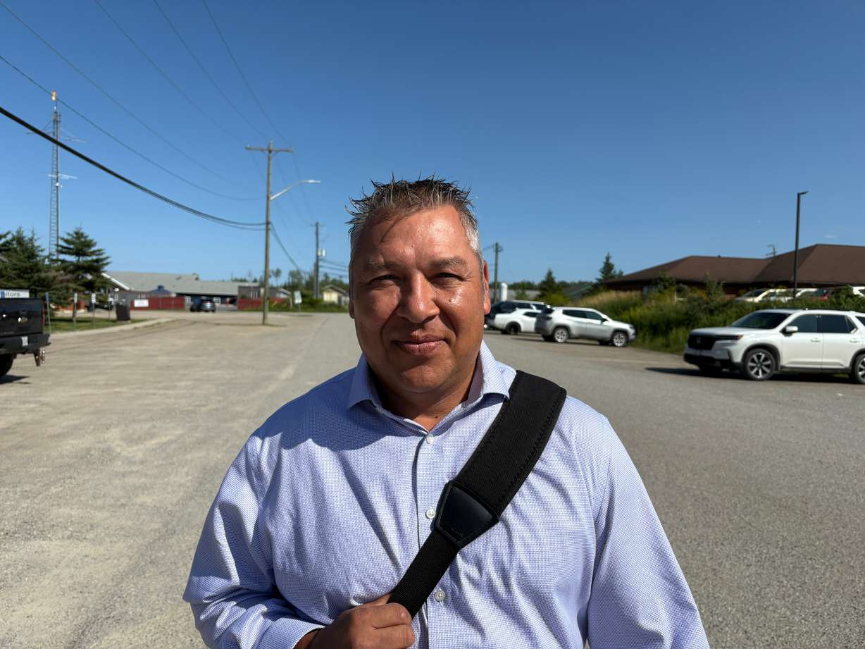Chief Tim Ominika stands on a street in Wiikwemkoong, Ontario, Canada, July 22.