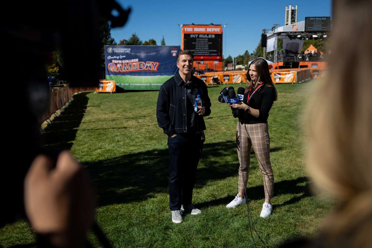 Rece Davis, host of ESPN's “College GameDay,” speaks to reporters at the location for ESPN’s “College GameDay” on the lawn at Heritage Halls on BYU campus in Provo on Friday.