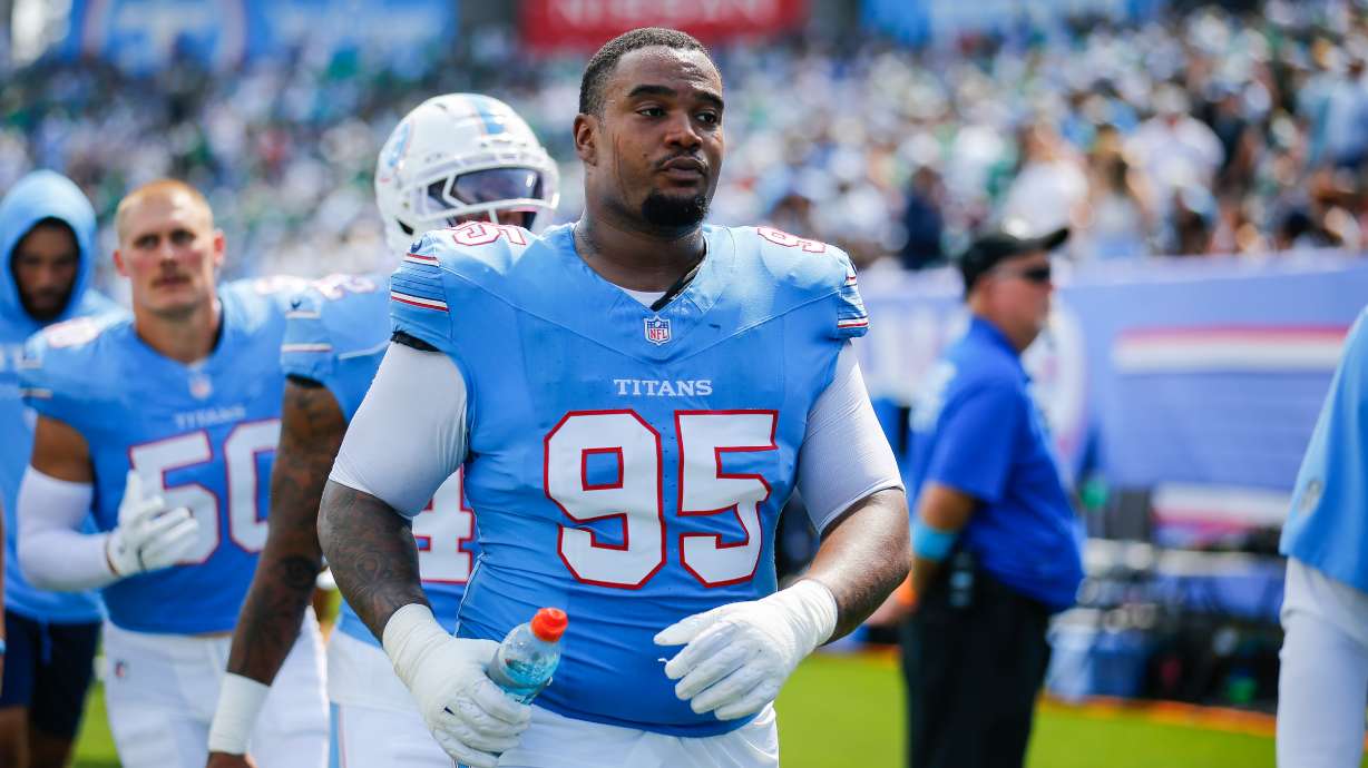 FILE - Tennessee Titans defensive lineman Jordan Elliott (95) walks to the locker room at halftime of an NFL football game against the Philadelphia Eagles in Nashville, Tenn., Sept. 20, 2026.