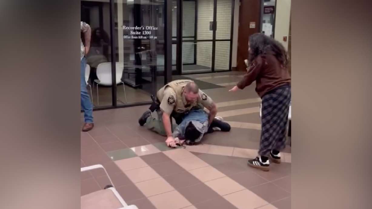 A tense meeting in Utah County over a change in data center plan policy ended in an altercation between protesters and law enforcement.