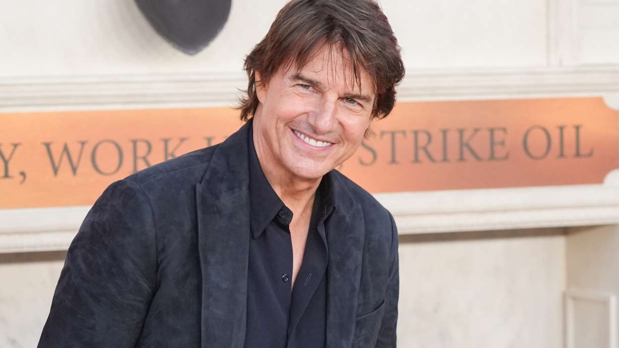 Tom Cruise arrives at the premiere of "Digger" on Sept. 28, in Los Angeles.