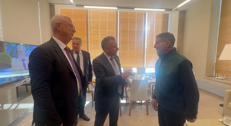 Special envoy Steve Witkoff and Russian presidential envoy Kirill Dmitriev attend a meeting with Stephen Hubbard, a 74-year-old retired schoolteacher who served a prison sentence in Russia following a conviction for mercenary activity and recently was freed, in Saint Petersburg, Russia, Wednesday, in this still image taken from video.