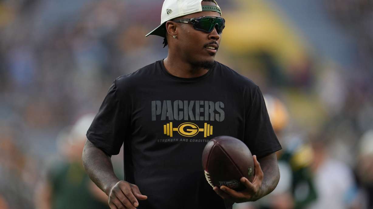 FILE - Green Bay Packers running back Josh Jacobs stands on the field before a preseason NFL football game against the Arizona Cardinals, Aug. 28, 2026, in Green Bay, Wis.