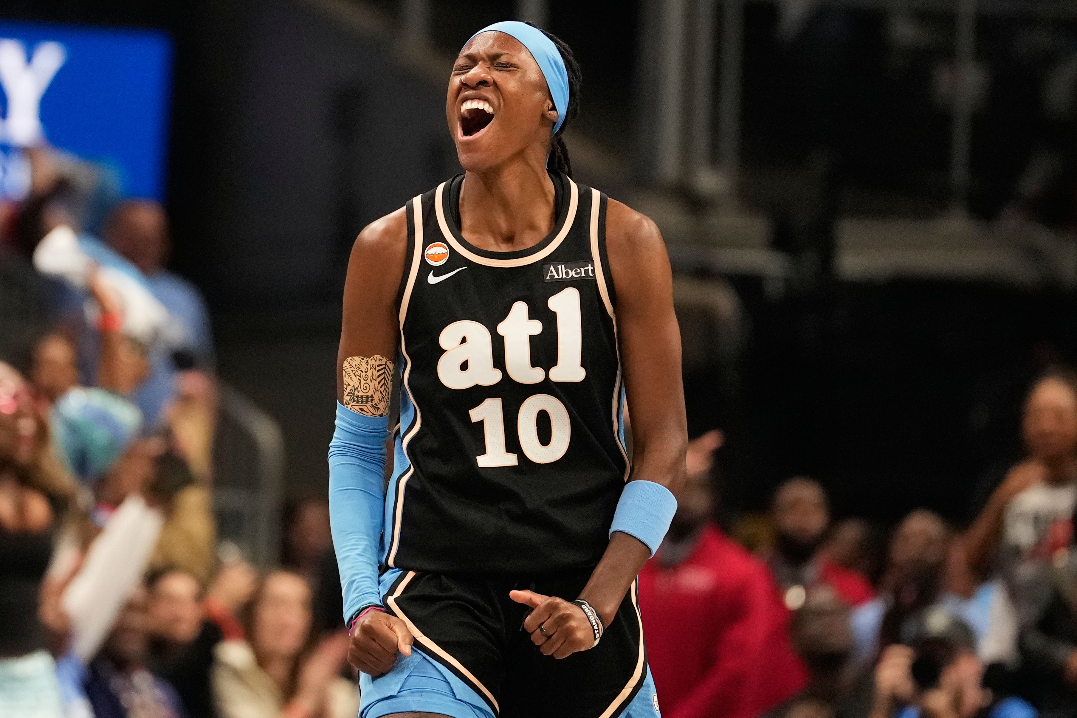 Atlanta Dream guard Rhyne Howard (10) celebrates scoring during the first half of Game 3 of the WNBA basketball finals against the Golden State Valkyries on Wednesday, Oct. 21, 2026, in Atlanta. 