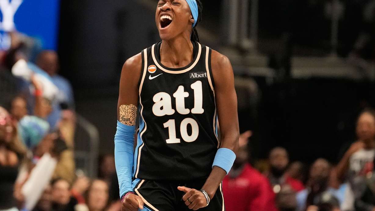 Atlanta Dream guard Rhyne Howard (10) celebrates scoring during the first half of Game 3 of the WNBA basketball finals against the Golden State Valkyries on Wednesday, Oct. 21, 2026, in Atlanta.