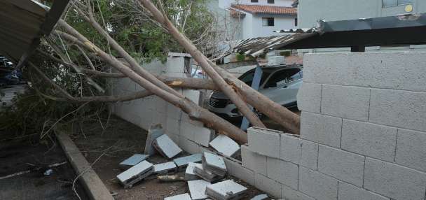 Violent Arizona storms bring possible tornado, toppled trees and golf ball-size hail
