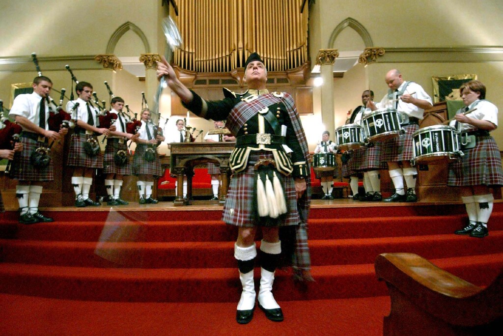 Drummer Major, Jack Marinello, twirls his mace while performing with the Utah Power Salt Lake Scots during celebration of "Kirkin 'O'th 'Tartan" on Sunday, Oct. 31, 2004. The First Presbyterian Church celebrates once a year on Reformation Sunday, which is the last Sunday in October.