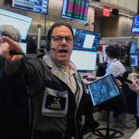 AI stocks tumble and drag down markets worldwide as oil prices climb