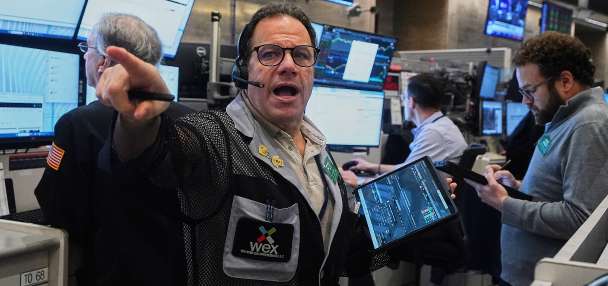 AI stocks tumble and drag down markets worldwide as oil prices climb