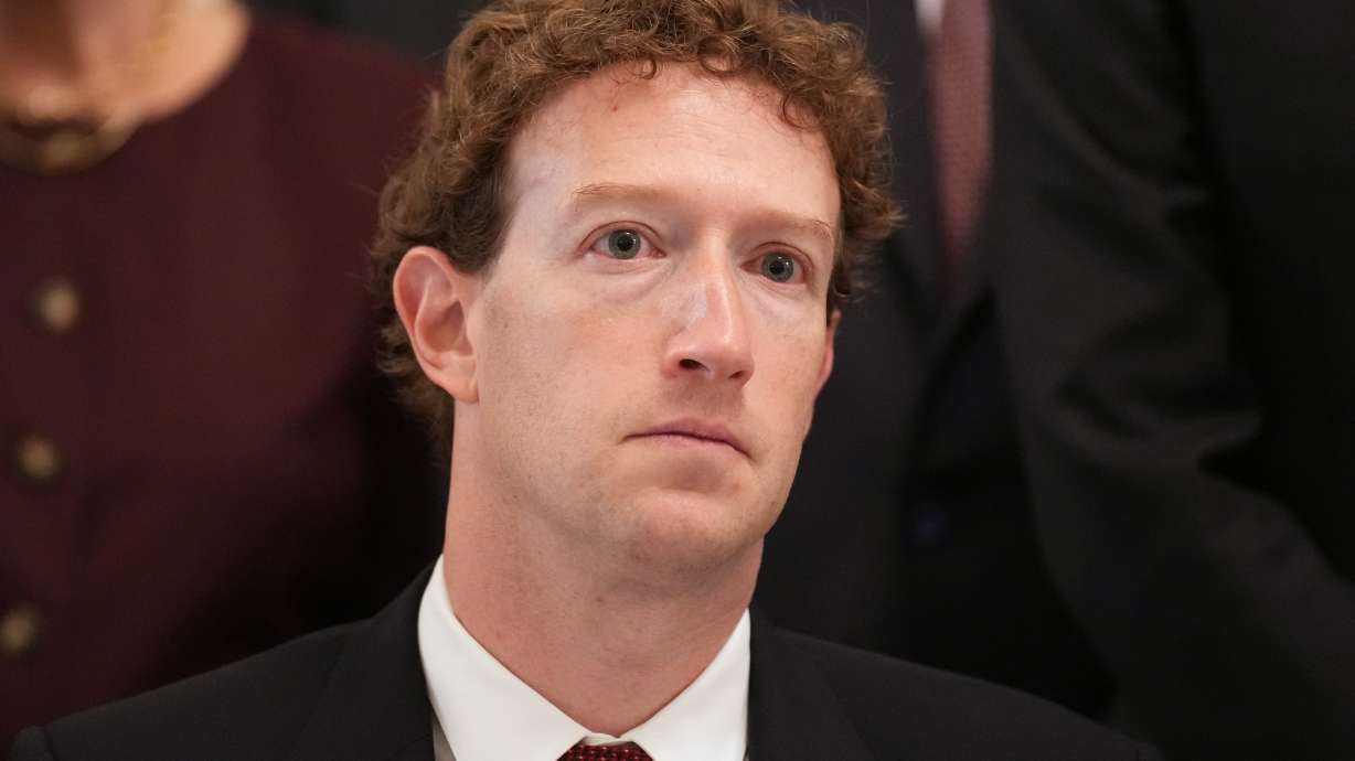 Meta CEO Mark Zuckerberg listens as President Donald Trump speaks in the East Room of the White House in Washington on Sept. 29 during a meeting with top executives from AI firms.