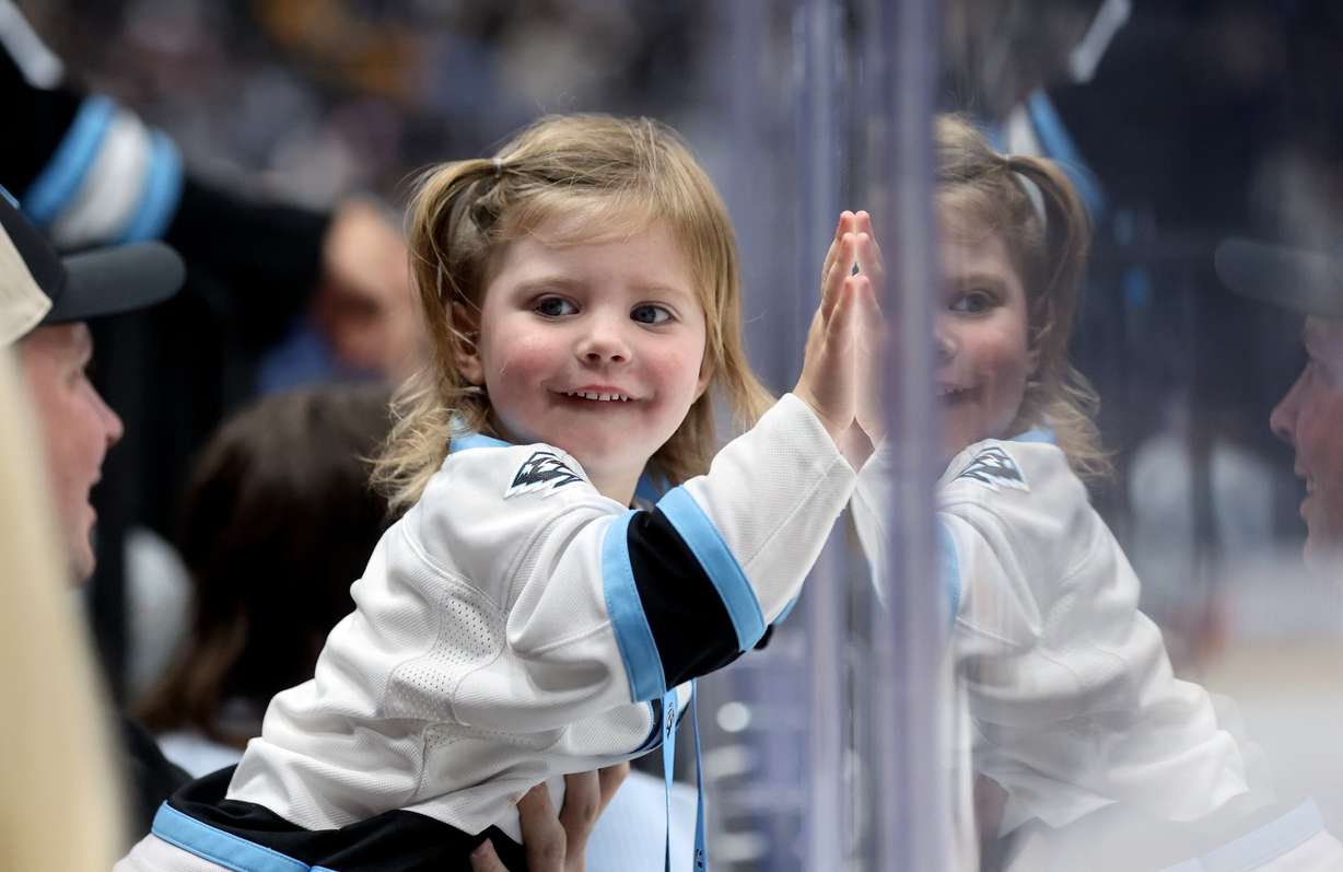Grace Griffitts, 2, watches the Utah Mammoth play the Pittsburgh Penguins in an NHL game at the Delta Center in Salt Lake City on Oct. 19. The Mammoth won 5-4.
