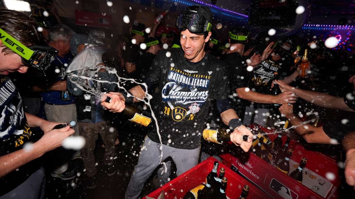 Milwaukee Brewers designated hitter Christian Yelich celebrates winning the NLCS Championship after Game 4 of baseball's National League Championship Series between the Milwaukee Brewers and the Los Angeles Dodgers, Thursday, Oct. 15, 2026, in Los Angeles.