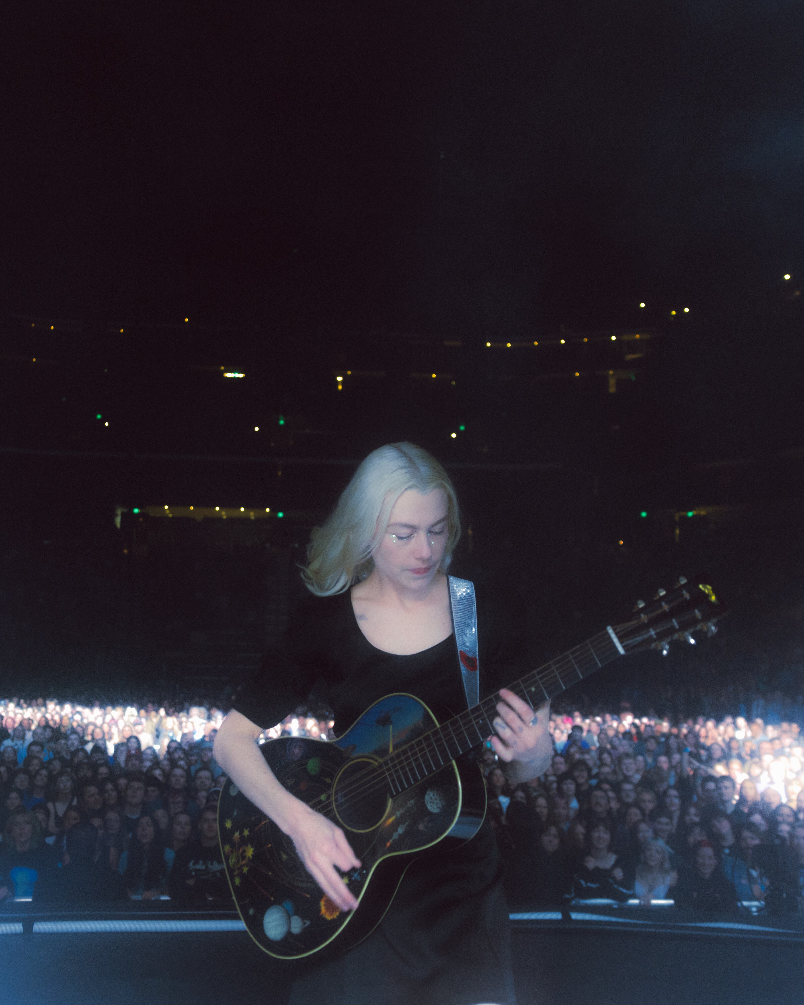 Phoebe Bridgers plays to a sold-out crowd at the Delta Center in Salt Lake City on Wednesday. The show is a no-phones concert and is part of her "Lost Weekend" tour.