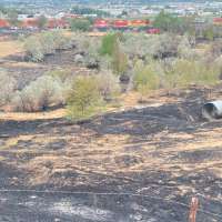 July fire north of Roy likely caused by passing freight train, probe shows