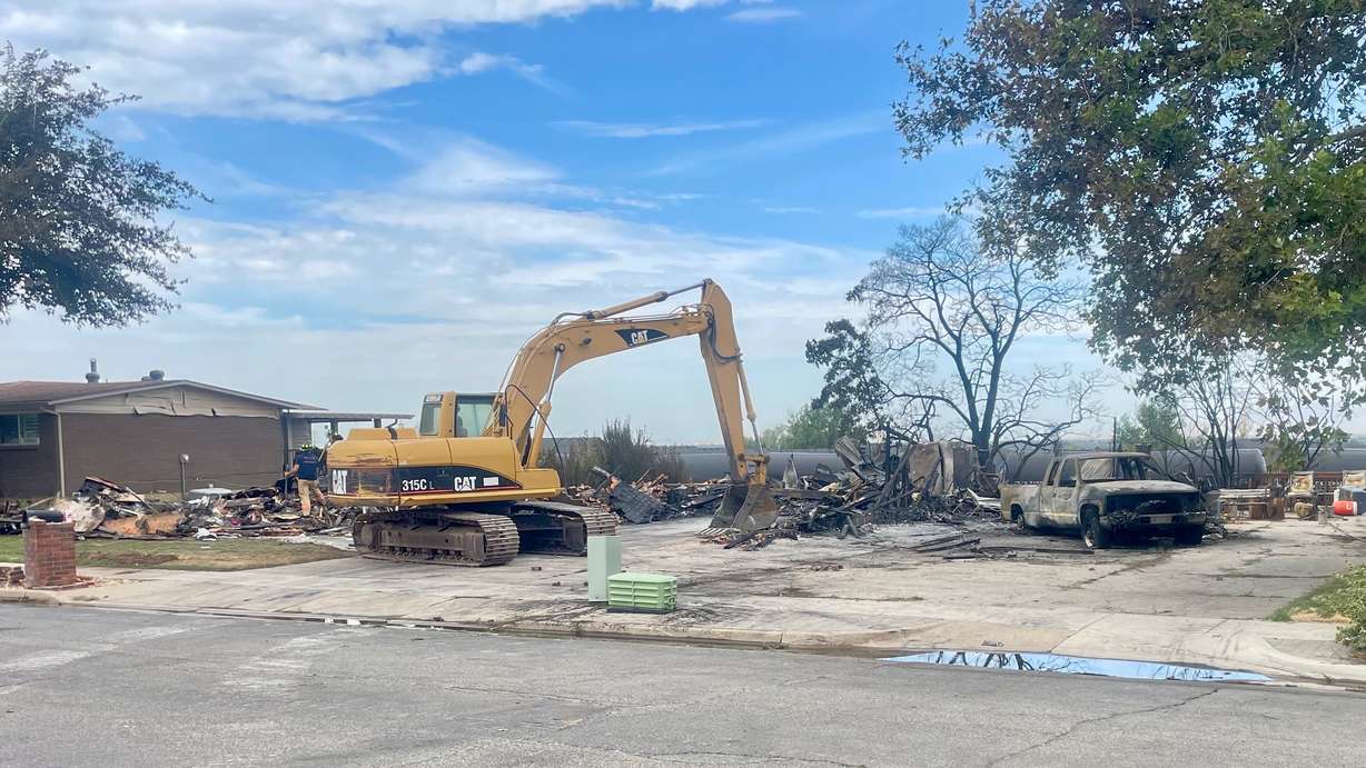 A train likely sparked a July 20 fire north of Roy, according to the probe into the incident, which doesn't delve into the fire in Roy at the same time that torched three homes. The July 21 photo shows one of the burned homes in Roy.