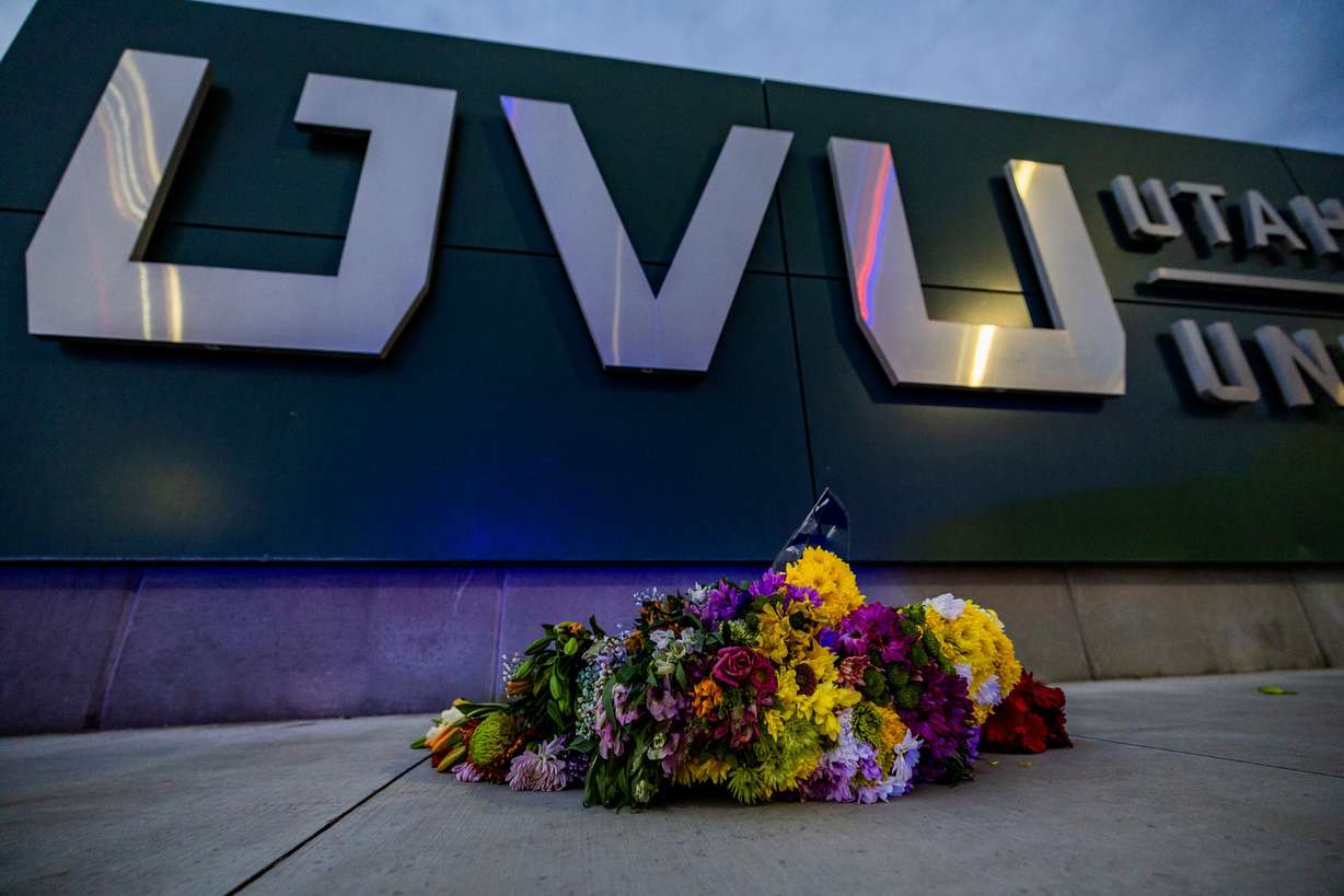 Flowers lie outside the Scott C. Keller Business Building near the scene Wednesday evening where Charlie Kirk, the CEO and co-founder of the conservative youth organization Turning Point USA, was fatally shot earlier in the day during Turning Point USA’s visit to Utah Valley University in Orem on Sept. 10, 2025.