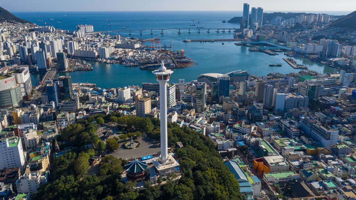 Overlooking the city with Busan Tower in Yongdusan Park. Nampo-dong, Busan, South Korea.