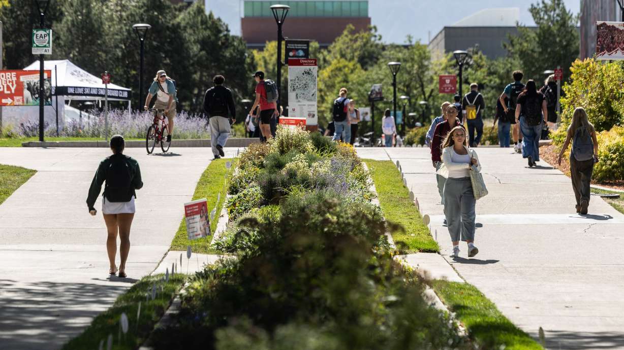 Students walk across campus at the University of Utah in Salt Lake City on Sept. 14.